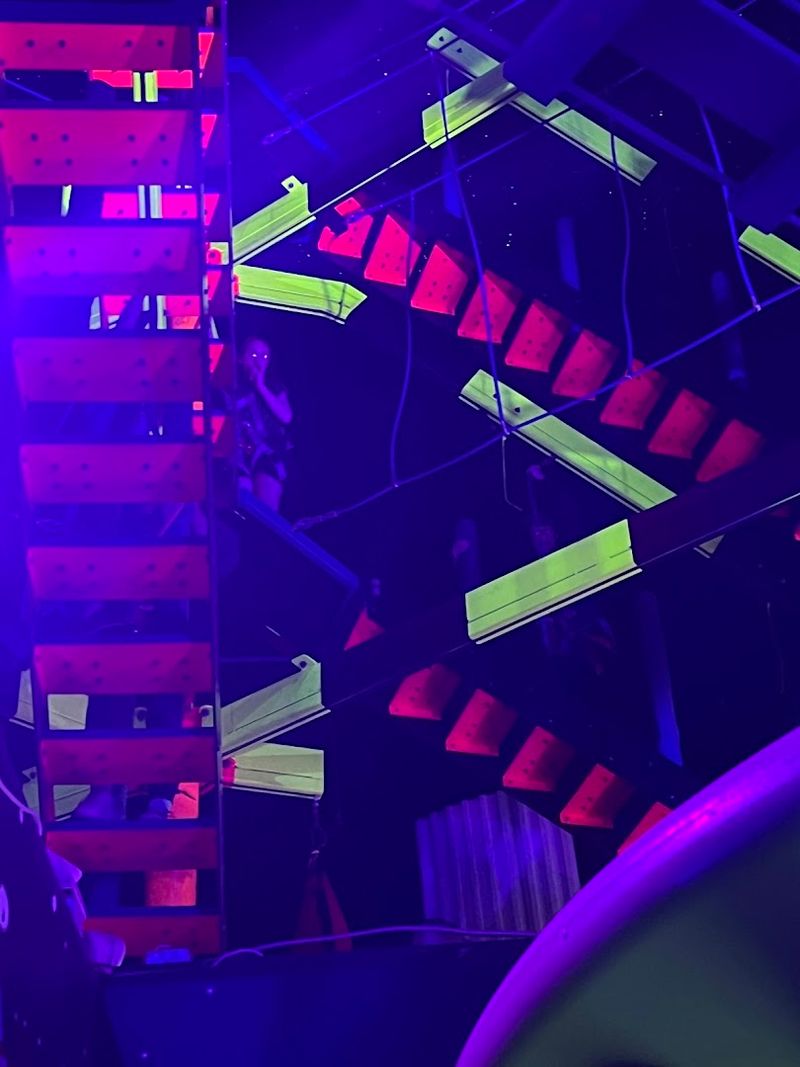 Laser Tag Battles In A Black-Lit Arena Built For Fast Reflexes