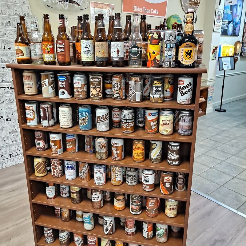 Old Bottles And Signs That Tell The Story Of A Classic Drink