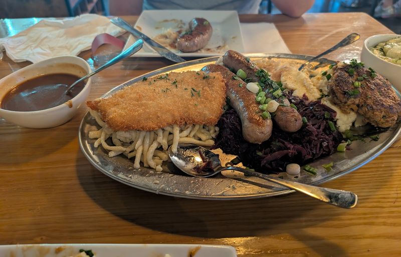 Bratwurst, Spaetzle, And Plates Made For Sharing