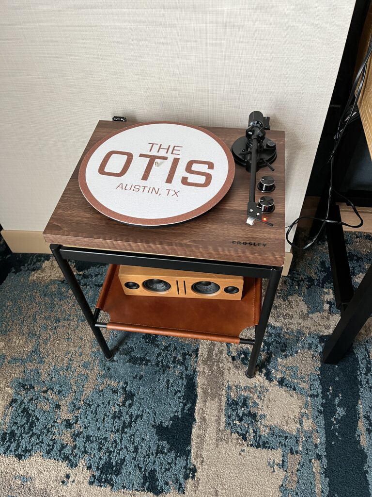Phonograph and vinyl records in every room at the Otis Hotel in Austin