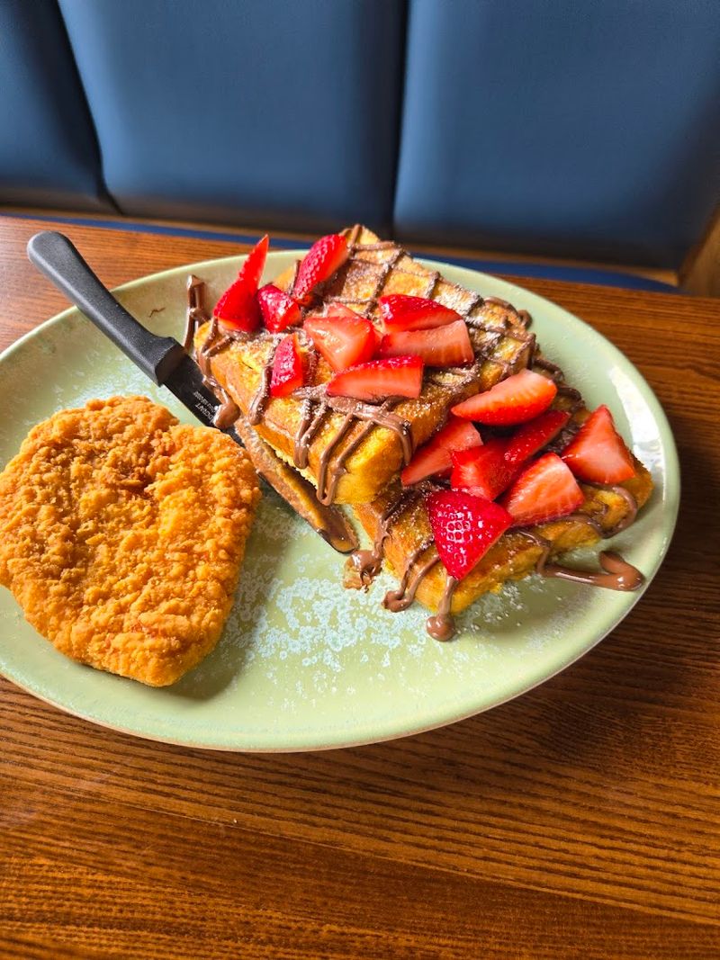 The French Toast Combo Adds Eggs, Meat, And A Bigger Plate