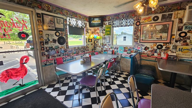 The Booth Made From A Pink Cadillac Seat