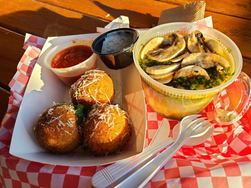 Arancini, Fried Ravioli, And The Appetizers Worth Ordering First