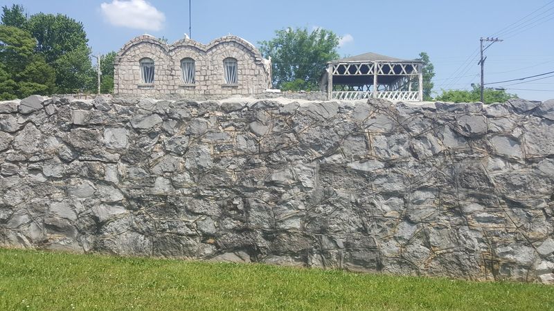 A Six-Story Deep Well And Stone-Enclosed Land