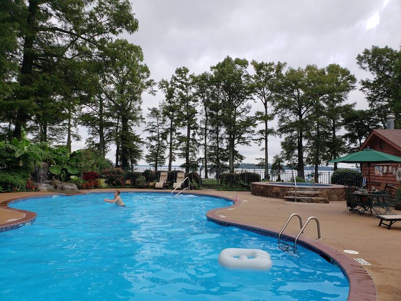 Resort Amenities Including Pool, Hot Tub, And Boat Dock