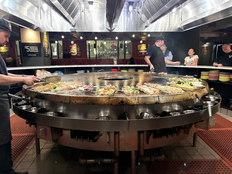 Watching Chefs Work The Giant Circular Grill