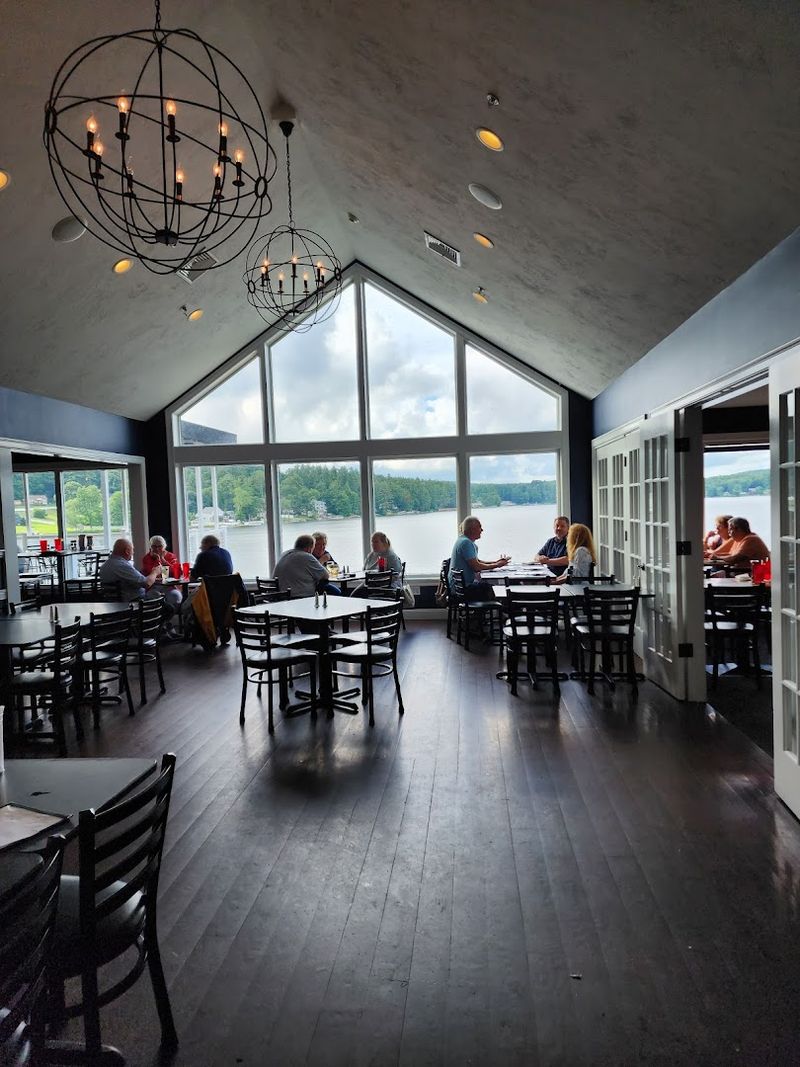 Bright, Spacious Interiors With Large Windows Facing The Lake