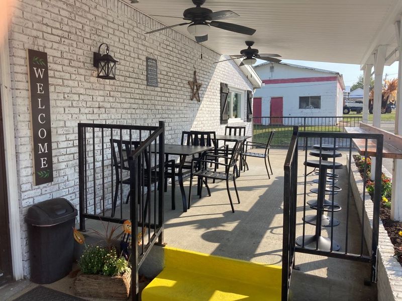 The Outdoor Seating Area Overlooking The Herb Garden