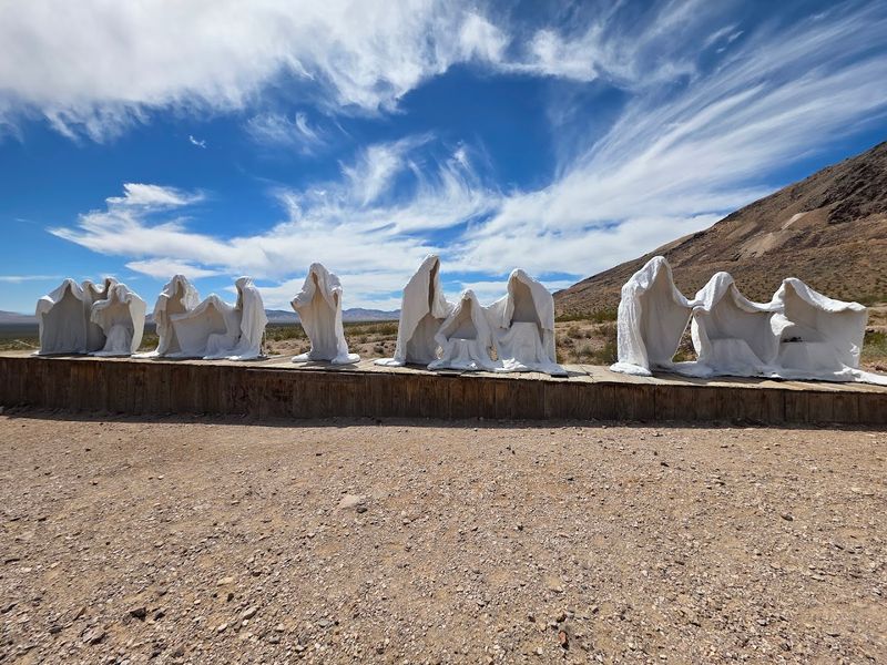 The Ghost Figures Nearby Make The Visit Feel Surreal