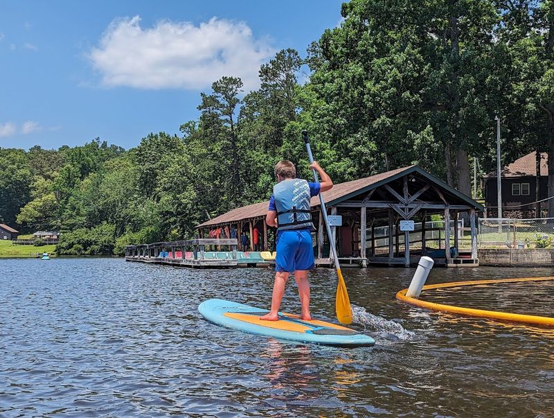 Kayaking And Paddling On Calm Water