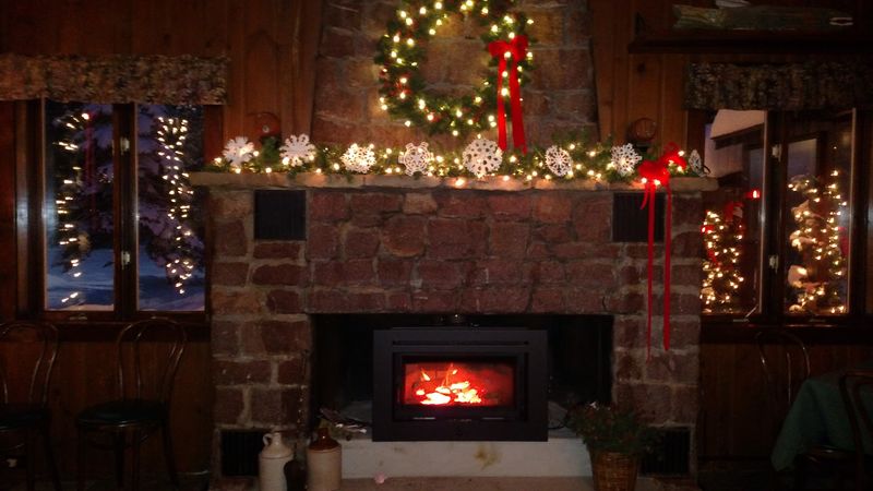 Original Woodwork And A Stone Fireplace Preserve Its Historic Character
