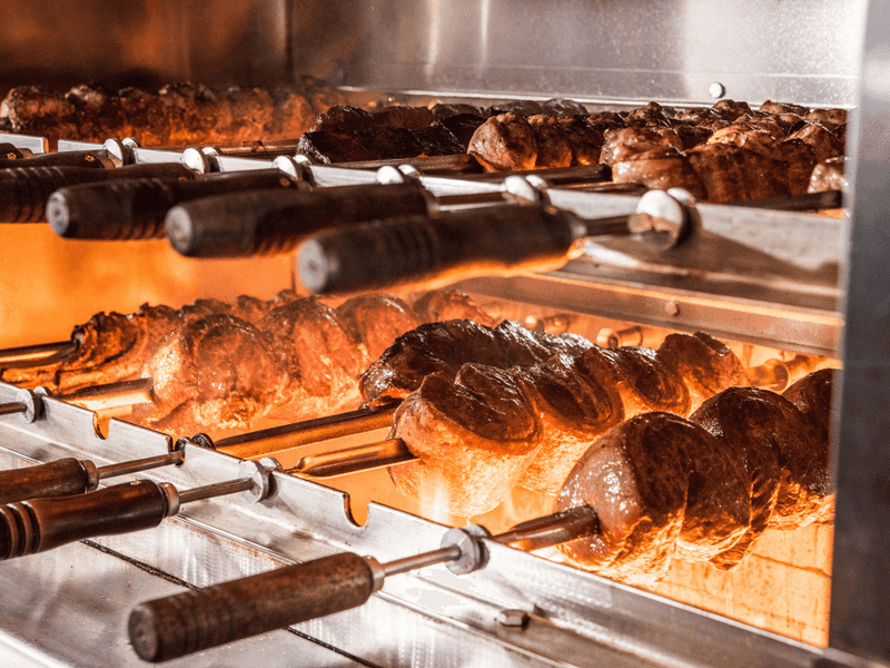 The Meat Is Cooked Over Open Flame