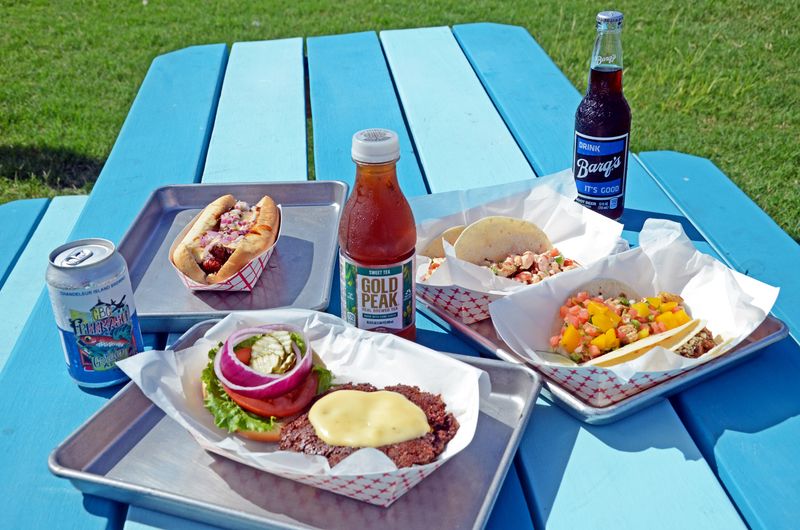 The Beach Dog And Nathan's Hotdogs Stand Tall