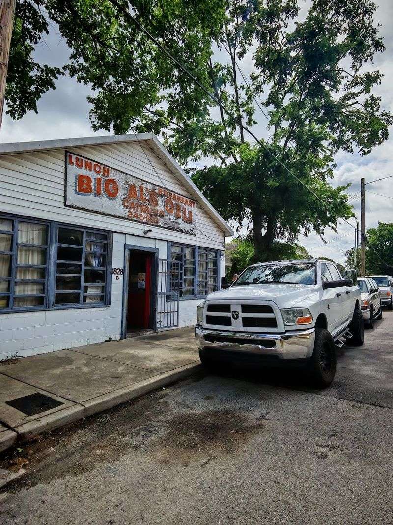 The White Building With Orange Signs That Hides Something Special