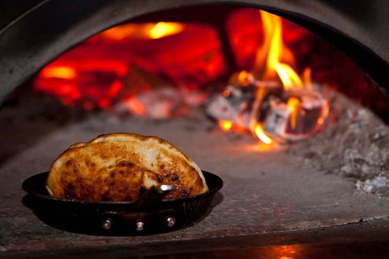 Every Pie Is Made For Fast Heat And Fresh Flavor