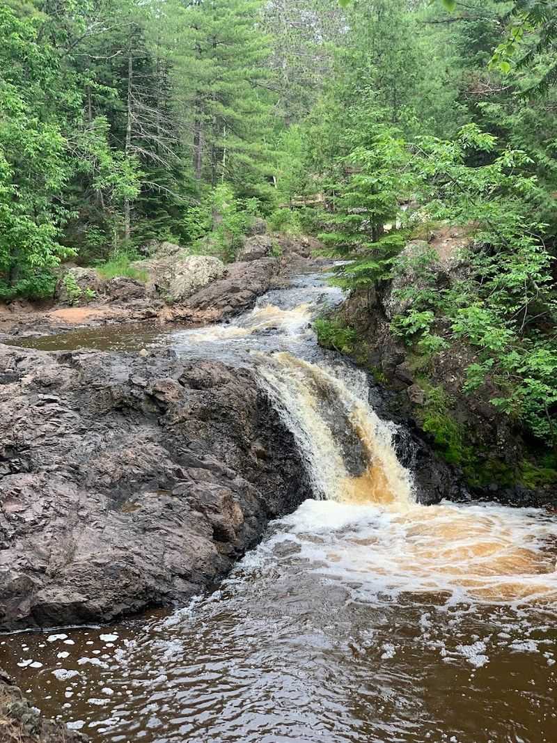 Red Rock And Rushing Water Make The Scenery Feel Dramatic