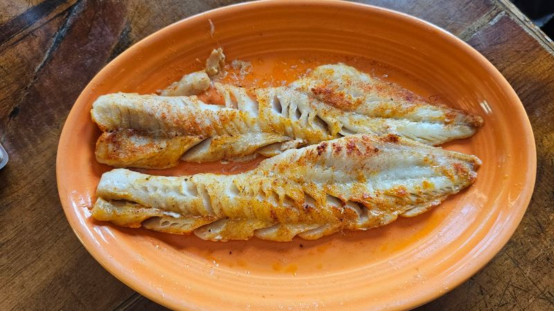 Freshwater Fish At The Center Of The Table