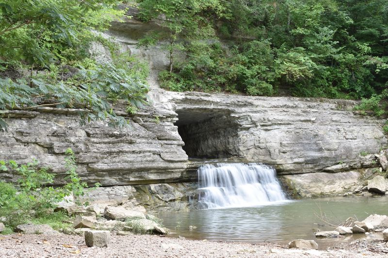 A Waterfall Pouring Through Rock Makes This Short Trail Feel Unforgettable