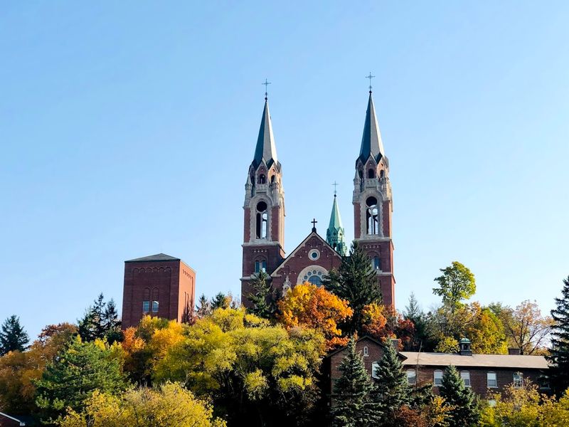 The Church's Architecture Looks Dramatic Against The Trees