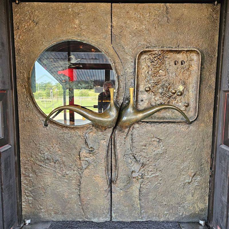 Those Iconic Brass Doors