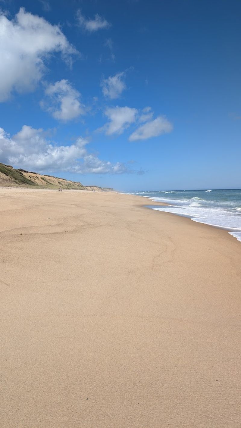 The Dramatic Sand Cliffs That Greet You Before You Even Touch The Sand