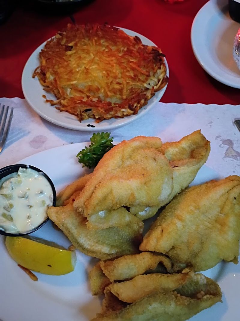 The Lake Perch Is Lightly Breaded And Fried Golden