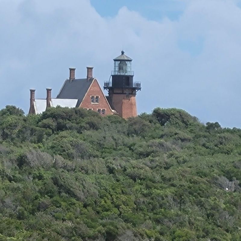 The Southeast Lighthouse Stands Watch Over The Bluffs