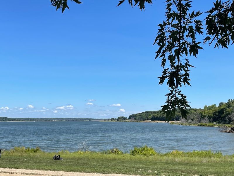 The Beach Sits Along Perry Reservoir's Wooded Rock Creek Arm
