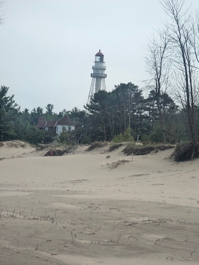 The Sandy Beach That Stretches Along Lake Michigan