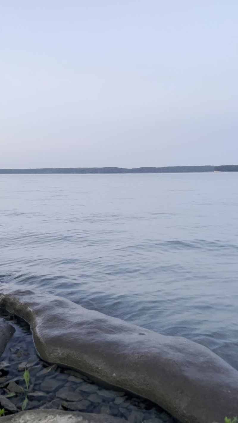 Calm Lake Views Make The Sand A Relaxing Place To Spend The Afternoon
