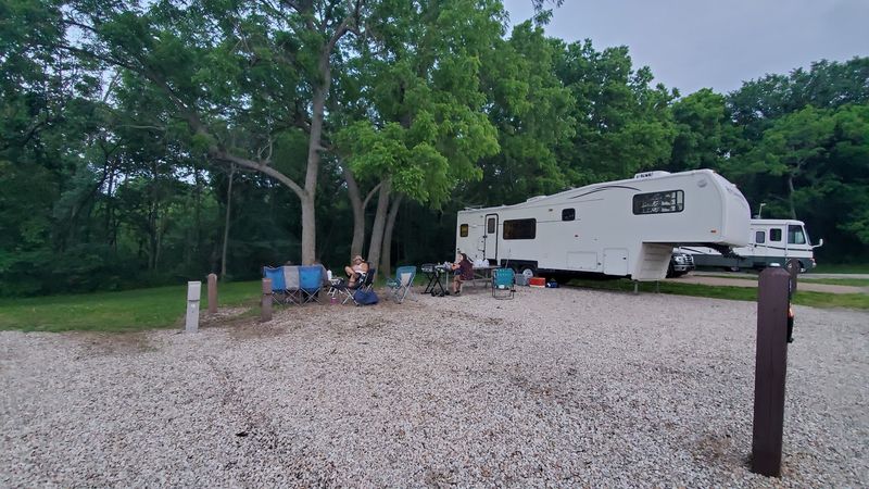 Campers Can Stay In Cabins Or Shaded Sites Close To The Water