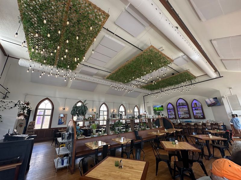 Suspended Lattice And Hanging Lights Transform The High Ceiling