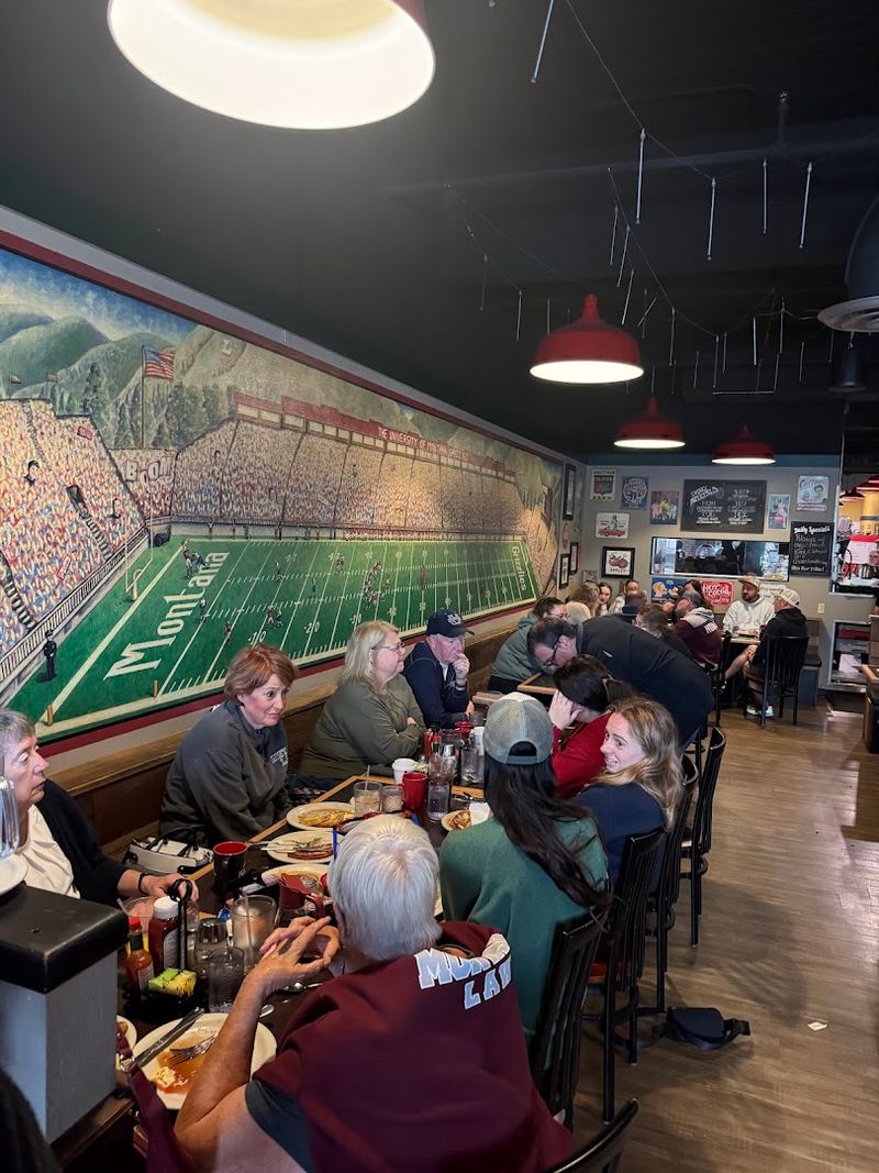 Vintage Signs And A Massive Griz Mural Give The Dining Room Its Personality