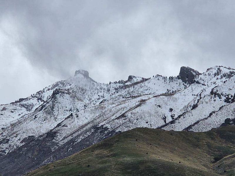 Snowcapped Peaks Make The Desert Feel Surprisingly Far Away