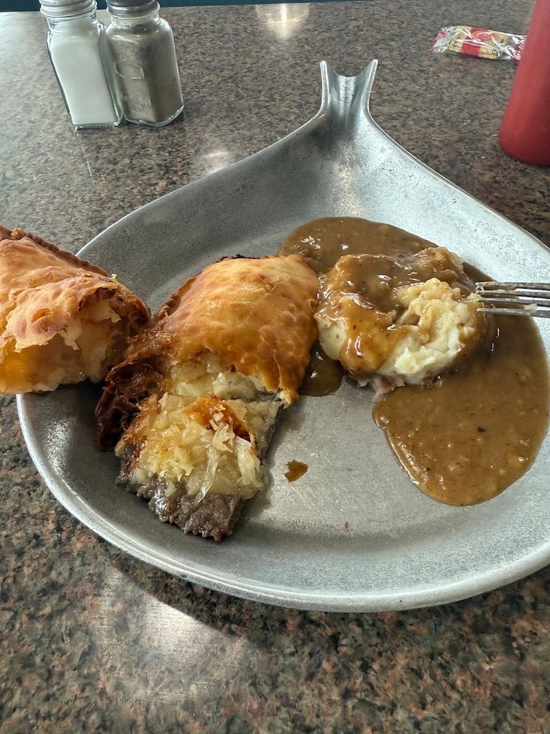 A Crispy Pastry Shell Hides A Seasoned Beef Filling