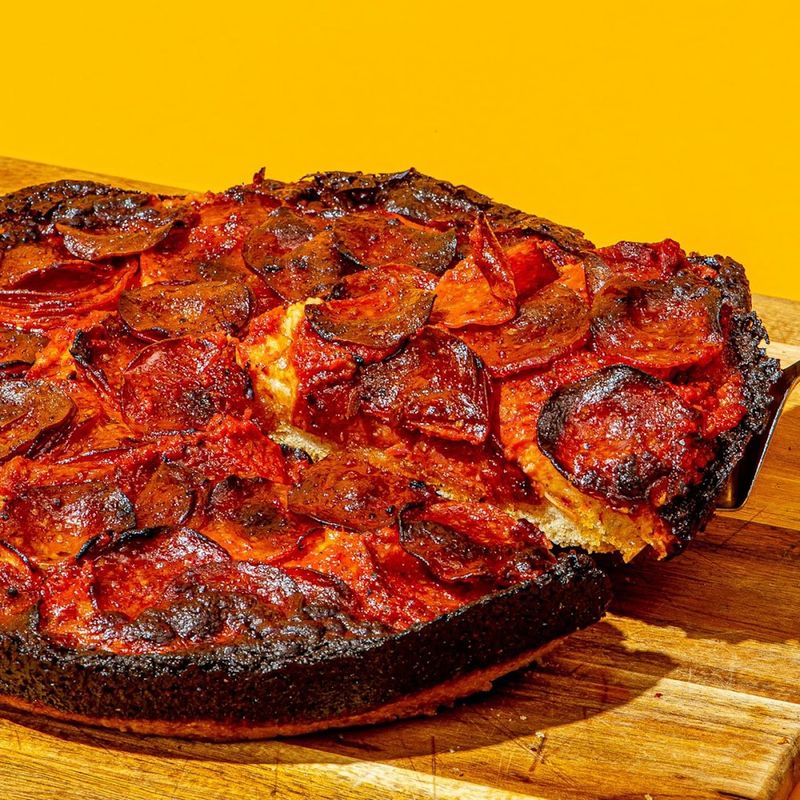 That Dark Crispy Cheese Edge Is The Bite Everyone Remembers