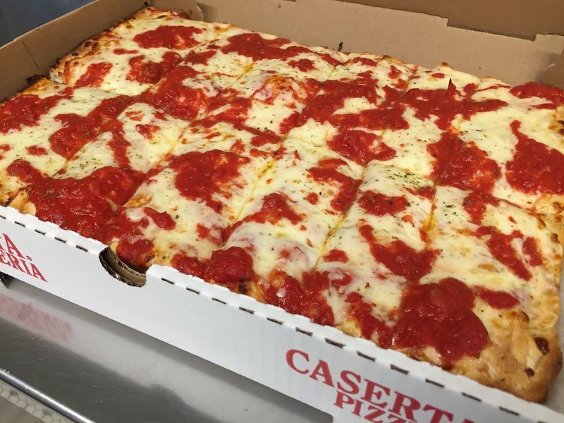 Homemade Sauce Gives Every Pizza Its Familiar Signature Flavor