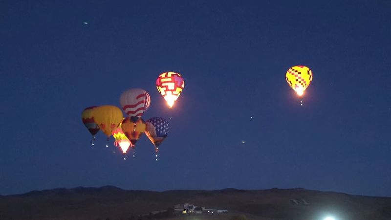 Dawn Patrol Sends Balloons Into The Dark Morning Air