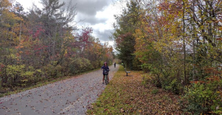 This 12.7-Mile Scenic Massachusetts Rail Trail Follows An Old Railroad Route Past Woodlands Rivers And Mountain Views
