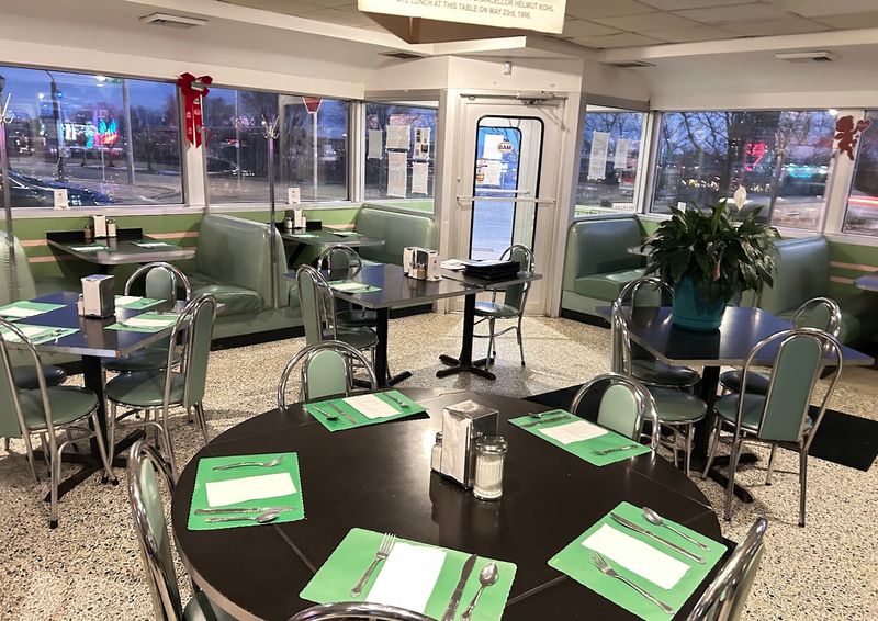 The 1950s Theme Comes Alive With Chrome And Mint-Green Booths