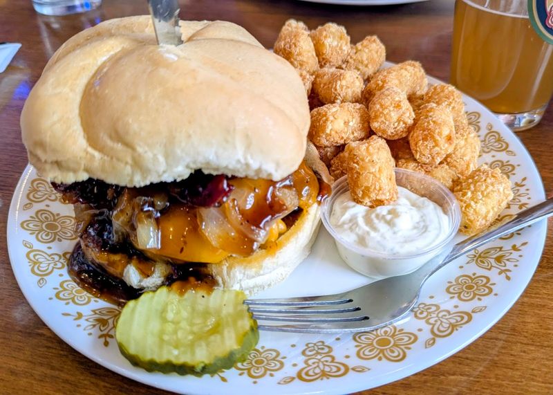The Half Pound Burgers Make Their Plates Look Almost Too Small