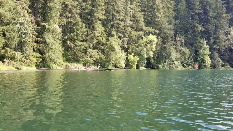 Paddling The Calm Surface Of A Crater