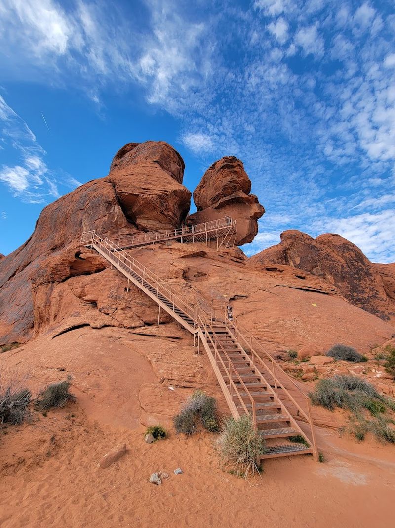 Atlatl Rock Rises From The Desert Floor