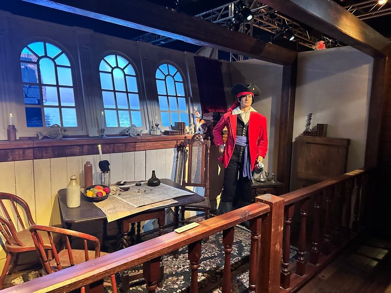 Lantern Light, Timber, And Storytellers In Costume