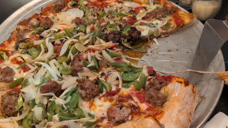 Hand-Tossed Dough That Defines The Experience