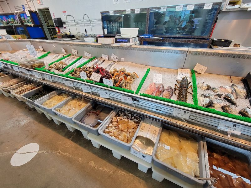 Live Tanks And A Seafood Counter With Range