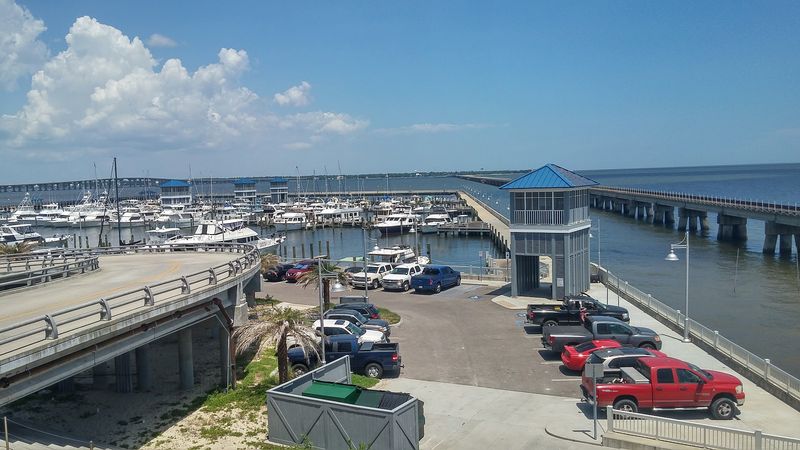 Sand, Sailboats, And A Harbor Downtown