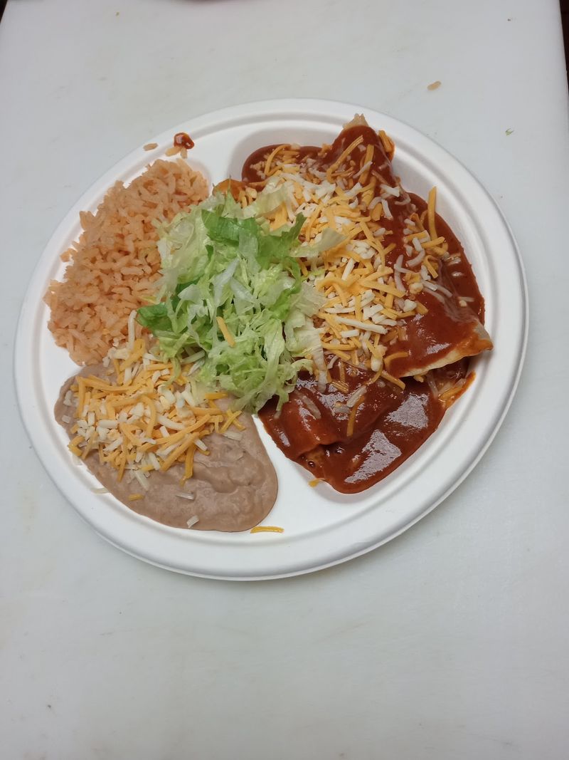 Chile Rellenos And Plates That Fill The Table
