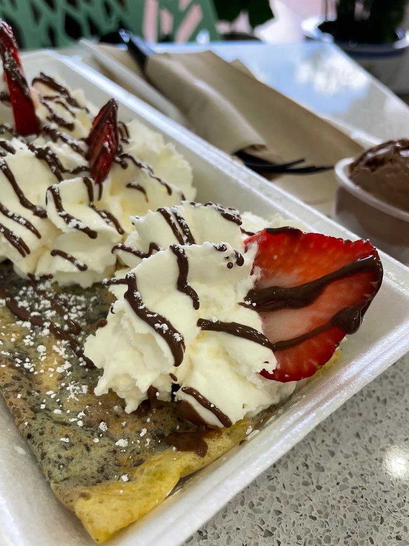 Churros Served With Ice Cream And All The Toppings