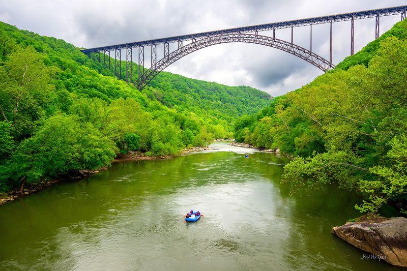 Whitewater Rafting Beneath The Arch